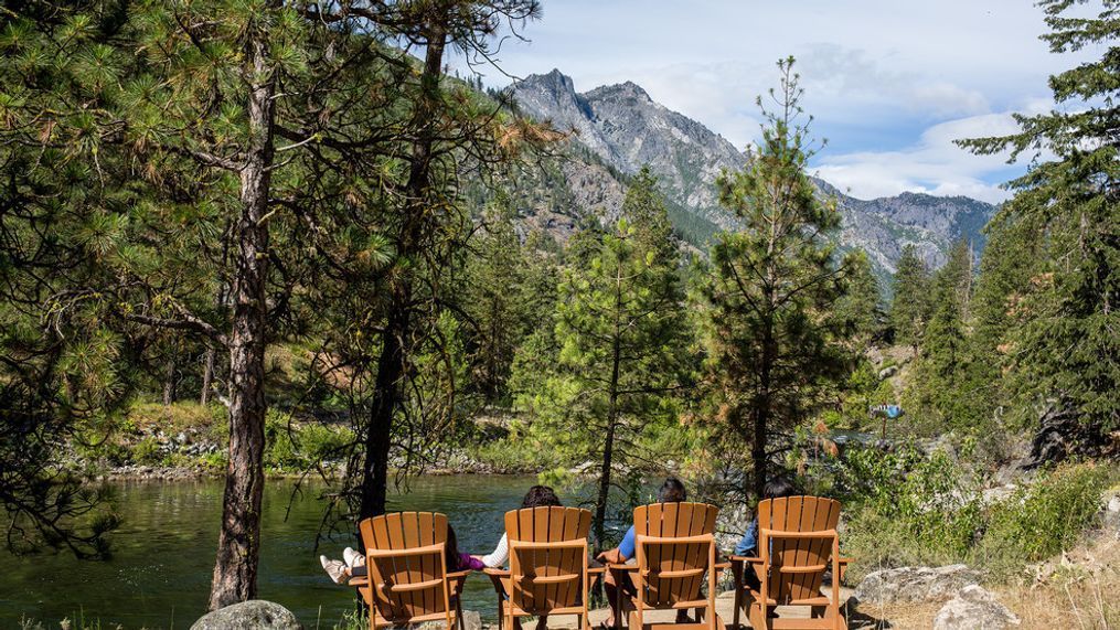 Meadow seating overlooking Icicle Creek (Photo: Courtesy of Sleeping Lady Mountain Resort)