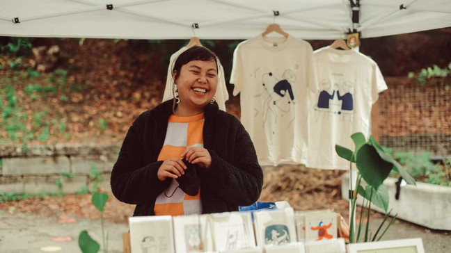 Artist Lillian Liu, owner of Pencil and Post, at the market on 10/3/2021. Photo credit: Isabella Sofia Photography (used with permission) 